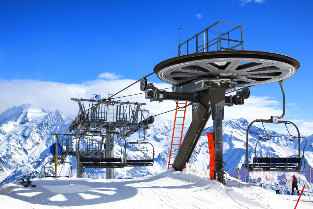 Ski lift chairs on bright winter day